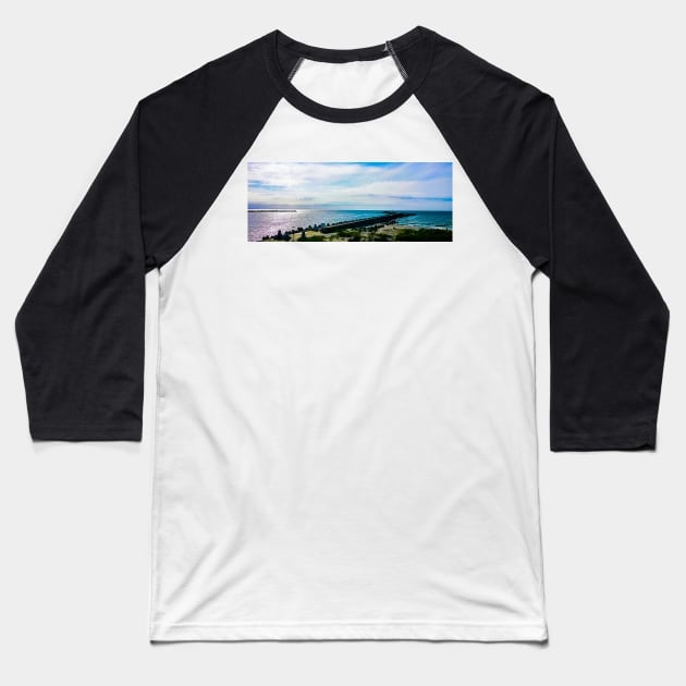 Pier with concrete breakwaters. Seascape, glare on the water of the Baltic Sea, rays of light Baseball T-Shirt by EvgeniiV